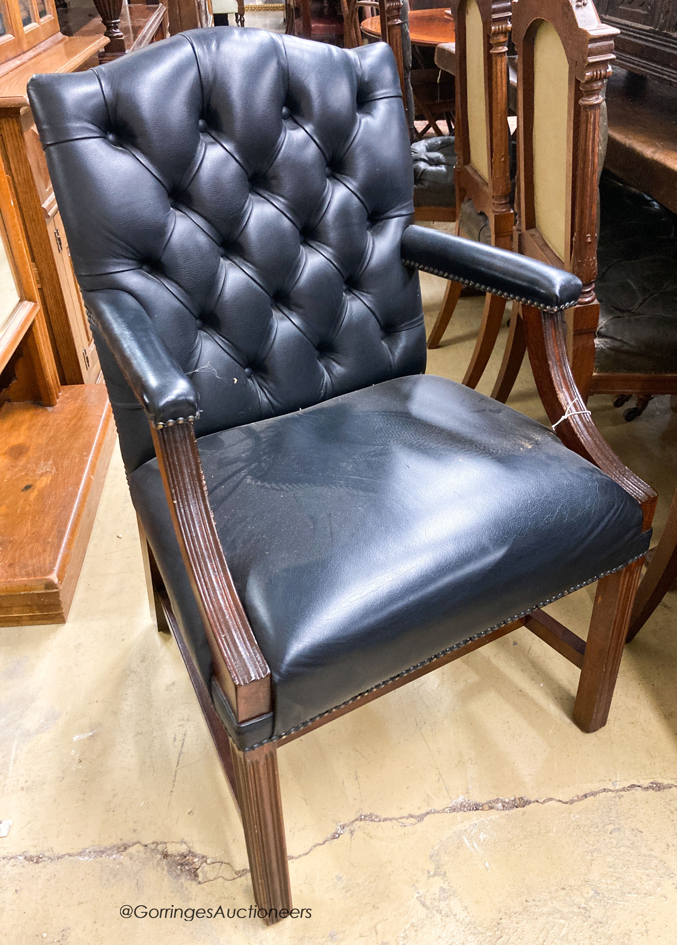 A set of four reproduction beech Gainsborough type elbow chairs, width 60cm, depth 60cm, height 98cm